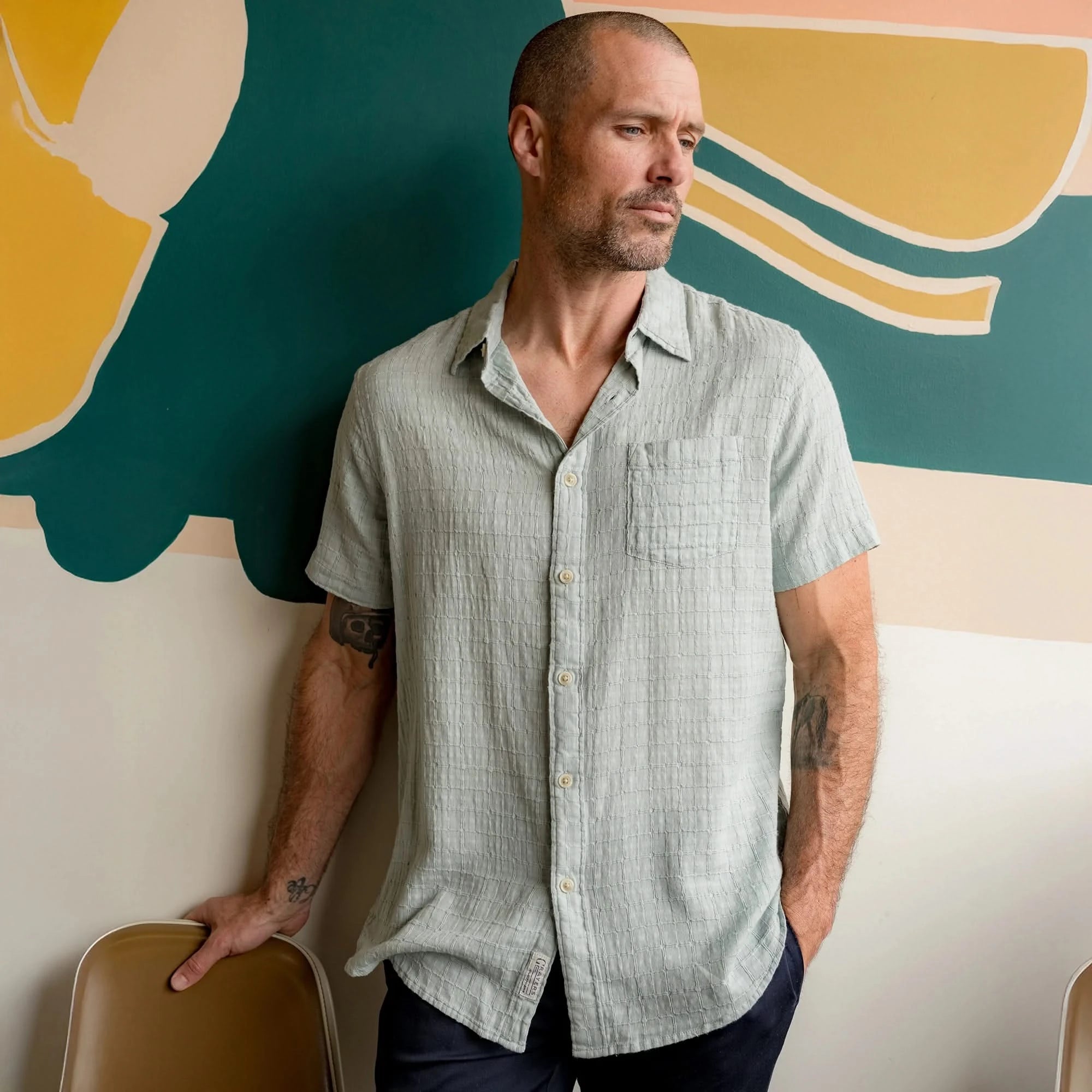 Model wearing Grayers Bamboo Dobby shirt in the abyss color, front view