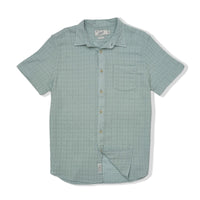 Flat lay of the Bamboo Dobby Short Sleeve Shirt in Abyss green/blue, featuring a textured dobby weave, natural buttons, and a single chest pocket.