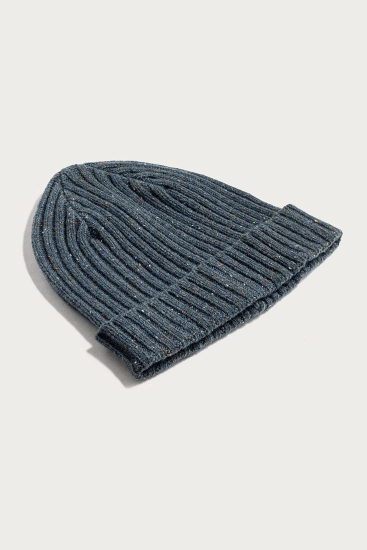 Blue chunky ribbed merino wool beanie folded cuff design, midweight winter hat photographed on neutral background from The Simple Man.