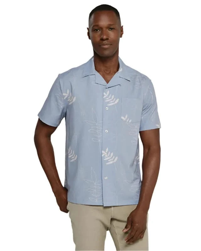 Model wearing 7 diamonds Ciro Camp shirt in dusk blue colorway, front view