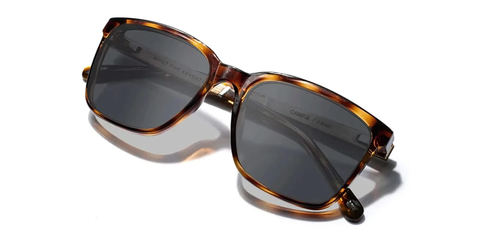 Camp Crag Sunglasses in Tortoise with walnut frames, grey Polarized lenses, front angled  closed temple view
