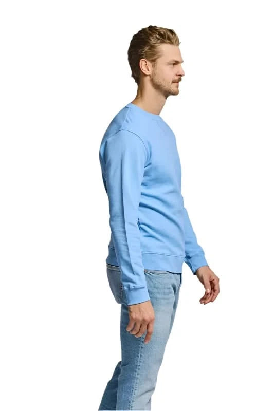 Model wearing Easy Mondays Crewneck sweatshirt in Azure color, side view
