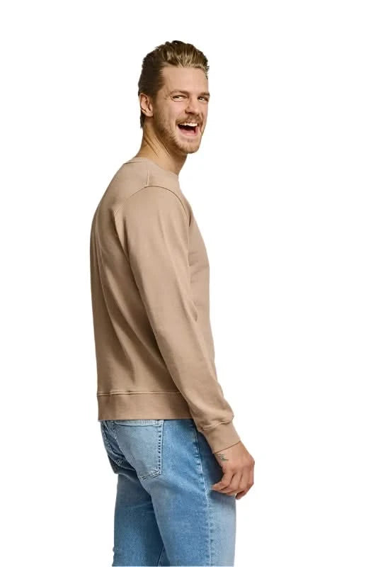 Model wearing Easy Mondays Crewneck sweatshirt in Latte color, side  view