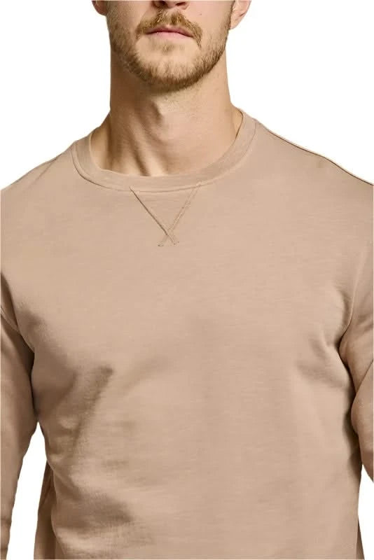 Model wearing Easy Mondays Crewneck sweatshirt in Latte color, front close up detail  view