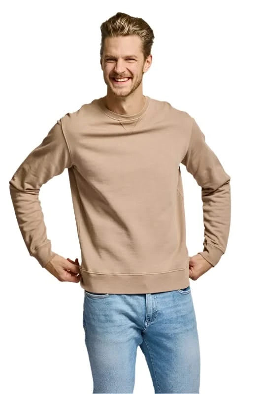 Model wearing Easy Mondays Crewneck sweatshirt in Latte color, front view