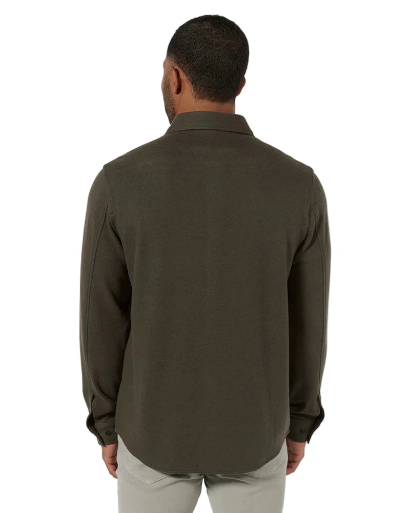 Back view of Generation Solid Shirt in olive, showcasing curved hem and tailored fit