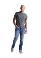 Model Wearing Duer Performance Denim Relaxed in Galactic Color, Front View