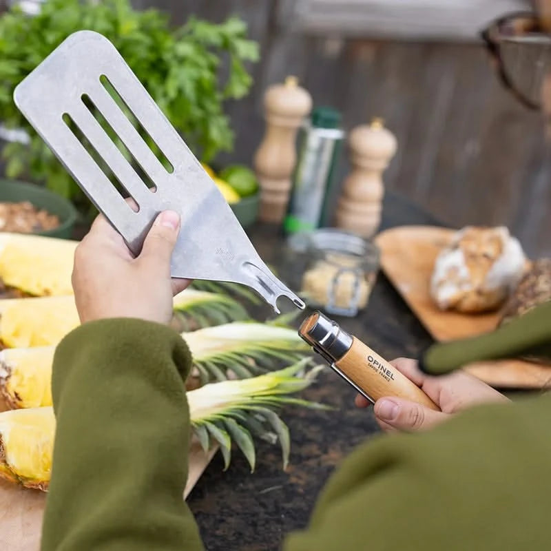 Opinel Grilling set, includes Knife, spatula attachment, and tongs- showing spatula being attached