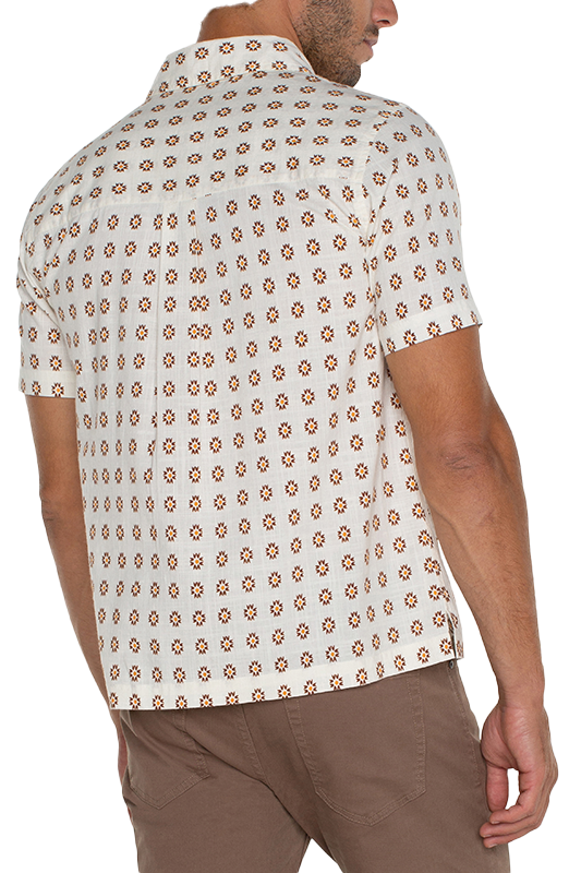 Model wearing Porcelain Clove floral print shirt, rear view