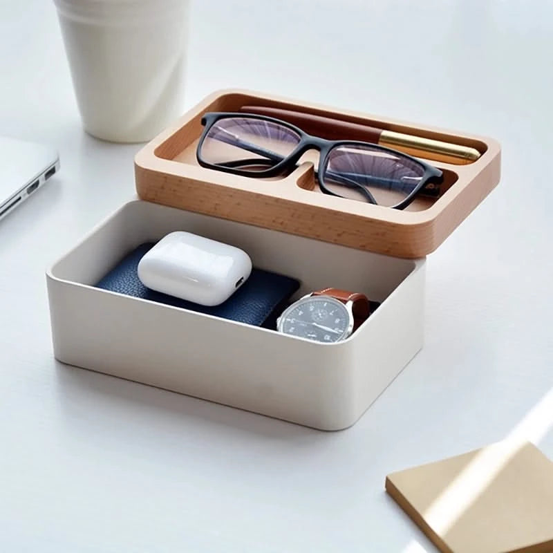 Revov Rotating Tray box in white, shown filled  with everyday carry items. lid rotated open
