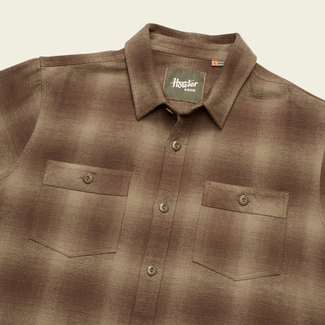 Flat lay detail of Rodanthe Blanket Flannel showing front chest pockets, collar, and Howler Bros label – 100% cotton heavyweight shirt-jacket