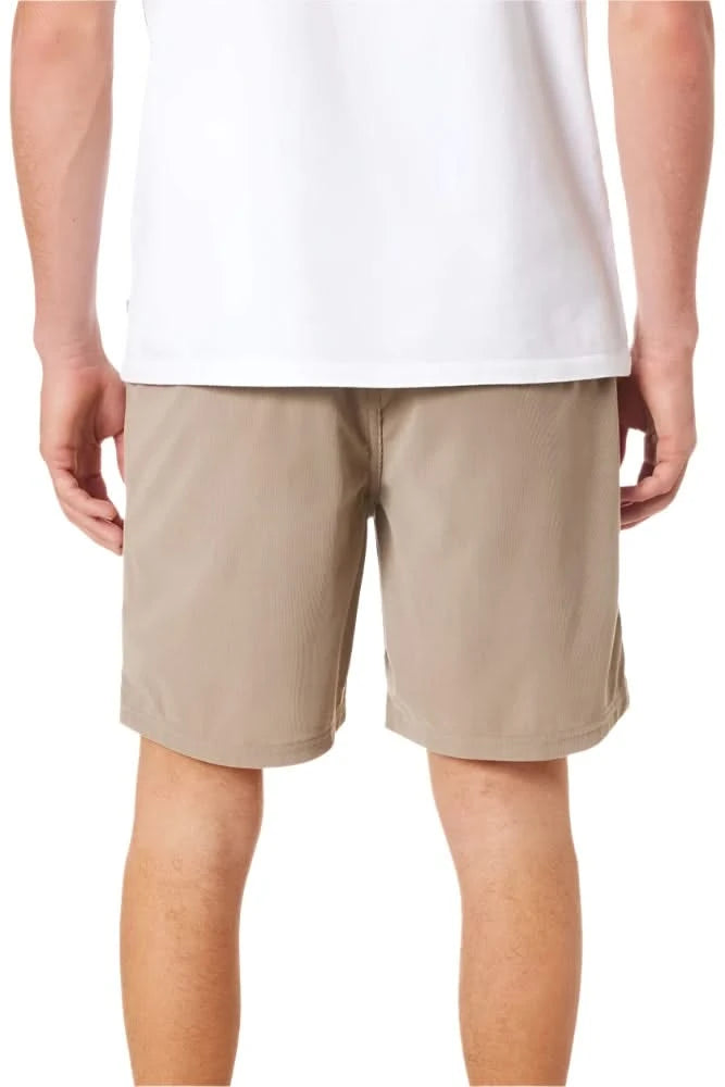 Back view of men’s khaki corduroy shorts with elastic waistband and welt pockets