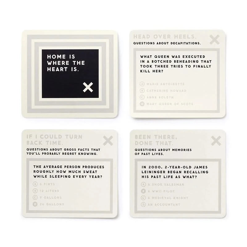 Close-up of Truly Terrifying Trivia cards showing creepy and bizarre trivia questions under categories like decapitations, past lives, and gross facts.