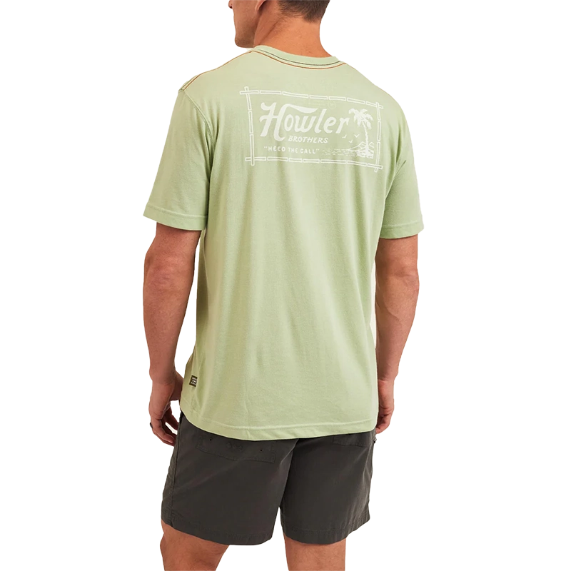 Model Wearing Howler Brothers tropic of howler pocket t-shirt in Julep Color, rear view