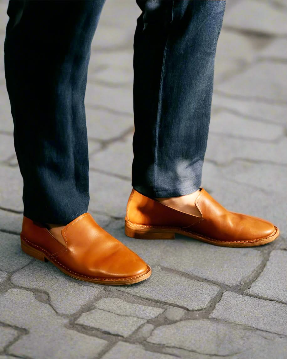 Model wearing Patnoflex Italian leather loafer with jeans, side profile showing fit and comfort.