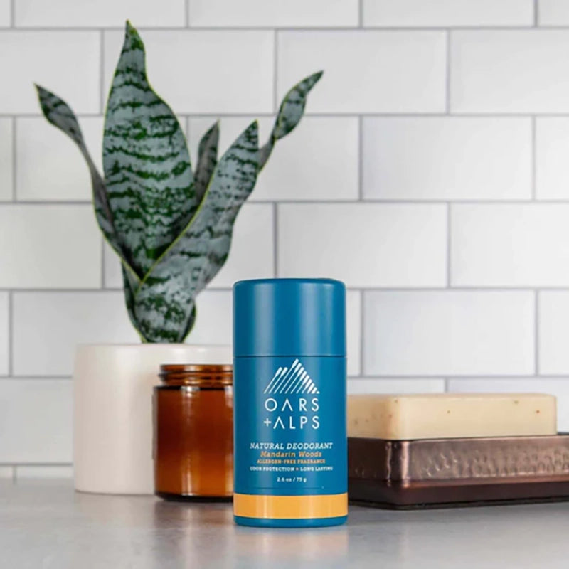 Oars & Alps Aluminum Free deodorant in Mandarin Woods fragrance, Stylized counter top view