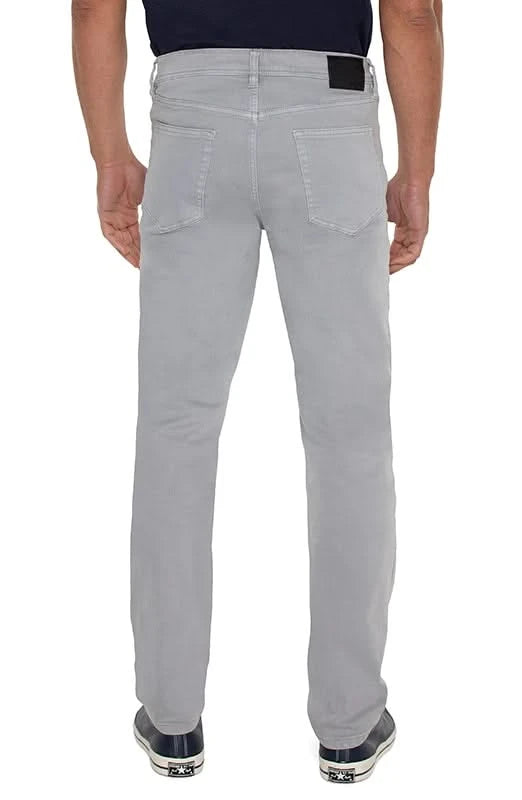 Model wearing Liverpool Regent Relaxed straight fit Denim in the silver mist ( Light Grey) colorway, rear view