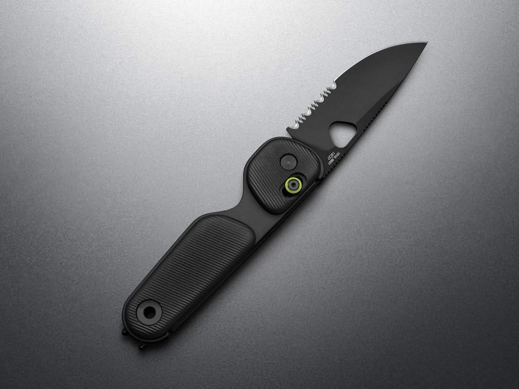 edstone compact folding knife with serrated drop point blade in Black color, featuring slide-lock and bent-wire pocket clip – available at The Simple Man.  Shown in open position with blade extended