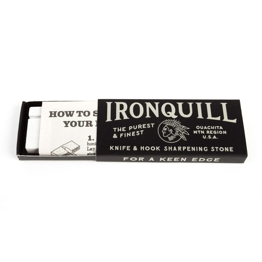 Molly Jogger Iron quill sharpening stone in the packaging shown with sharpening instructions