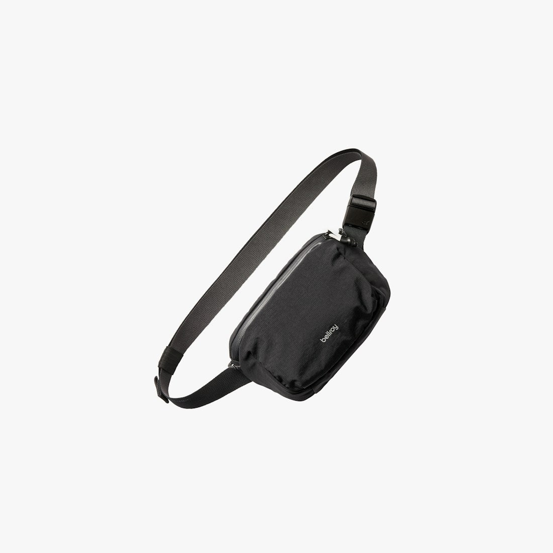 Bellroy Lite Belt Bag in black lightweight nylon with zip front pocket, front view - The Simple Man