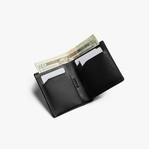 Bellroy Note Sleeve RFID leather wallet in Black, open showing cards and cash - The Simple Man