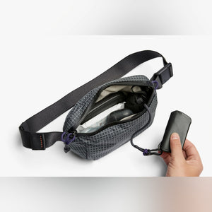 Bellroy Lite Belt Bag in Arcade Grey, open showing interior and pocket - The Simple Man