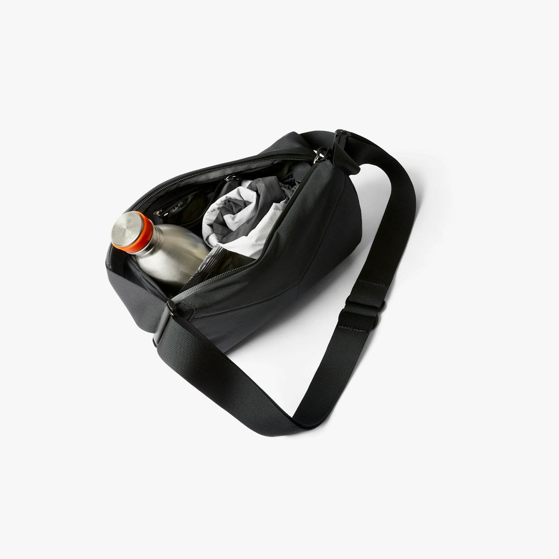 Bellroy Venture Sling 6L in Black, worn across the body - The Simple Man