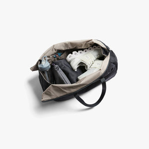 Bellroy Lite Duffel in Black, open showing packed gear - The Simple Man