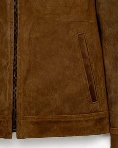 Close-up of the lower front pocket and zipper on the brown rough-out suede jacket - The Simple Man