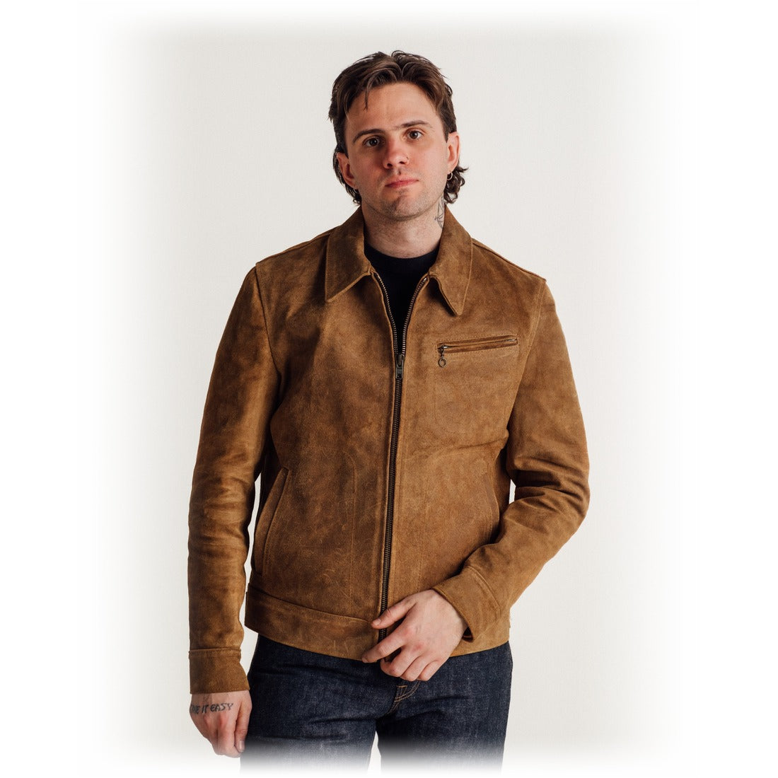 Man wearing the brown rough-out suede jacket zipped, front view on model - The Simple Man