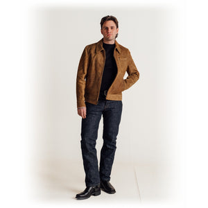 Full length view of a man wearing the brown rough-out suede jacket with dark jeans and boots - The Simple Man