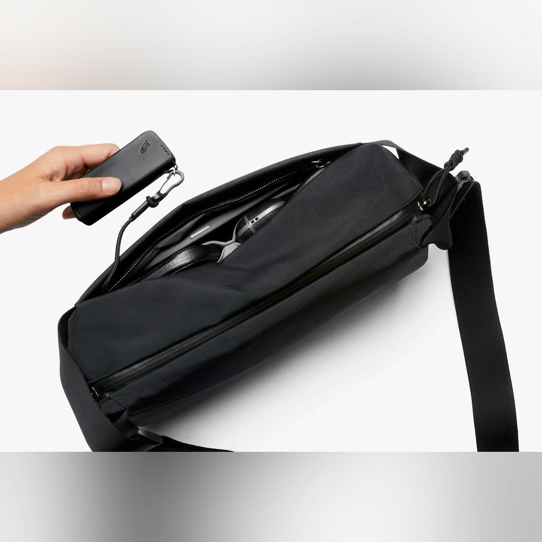 Bellroy Venture Sling 6L in Black, open with contents - The Simple Man