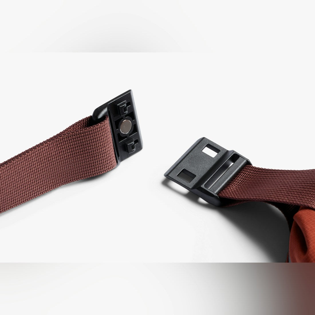 Bellroy Lite Sling Mini in Clay, close-up of the strap buckle - The Simple Man