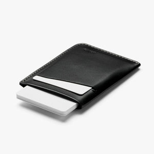 Bellroy Card Sleeve wallet in Black, side view with a card tucked in the front slot - The Simple Man