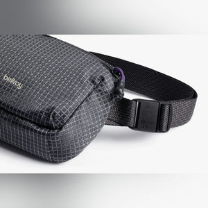 Bellroy Lite Belt Bag in Arcade Grey, close-up of ripstop fabric and strap - The Simple Man