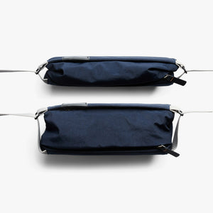 Bellroy Sling Mini sling bag in Navy, front and back views - The Simple Man