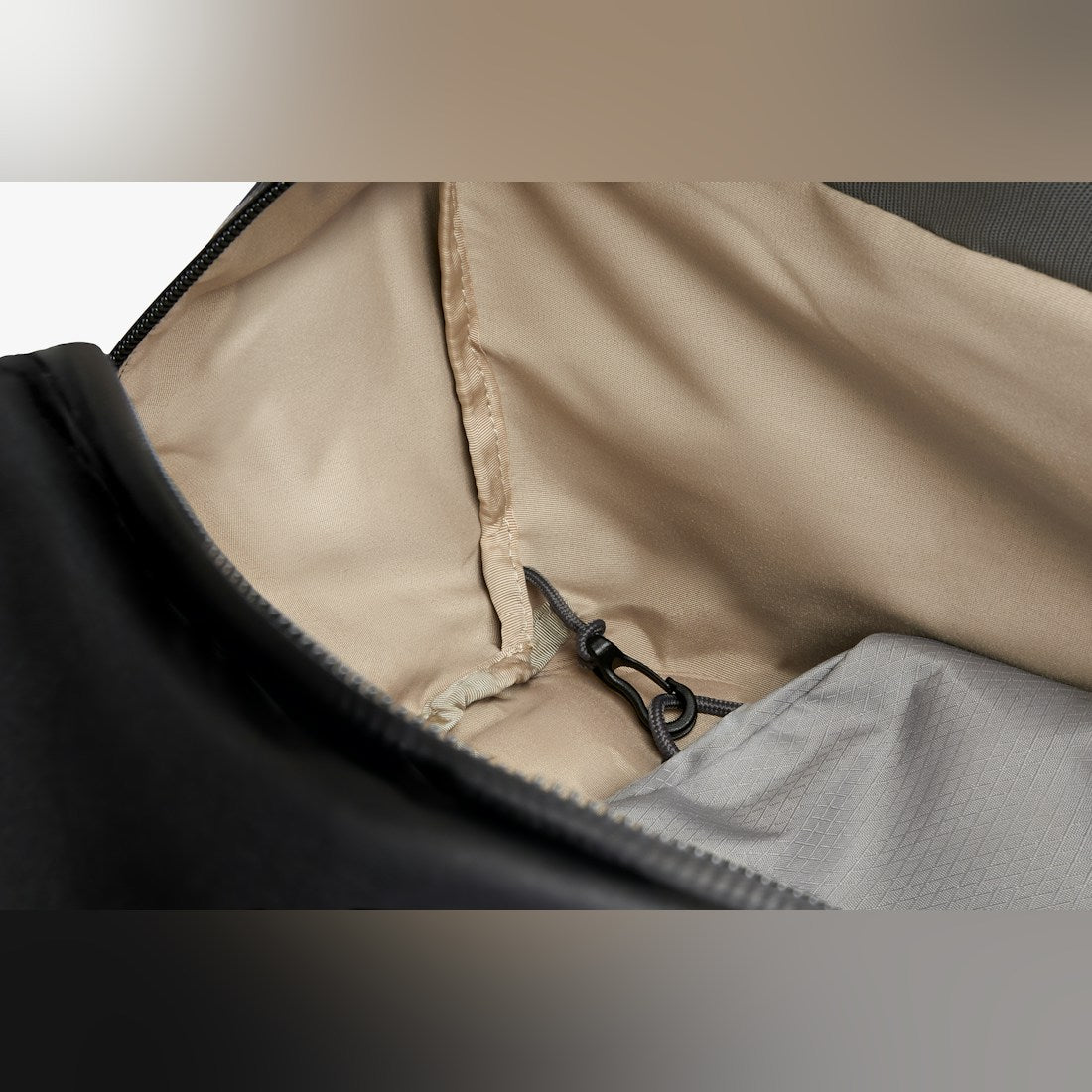 Bellroy Venture Duffel 40L in Black expanded view showing contents that fit in the bag - The Simple Man