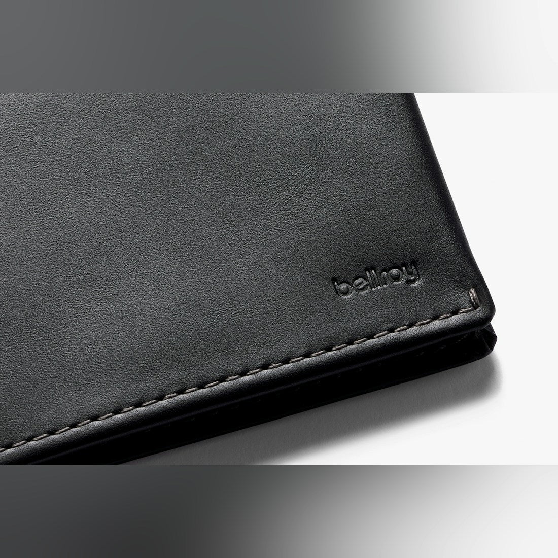 Bellroy Slim Sleeve wallet in Black, close-up of leather and embossed logo - The Simple Man