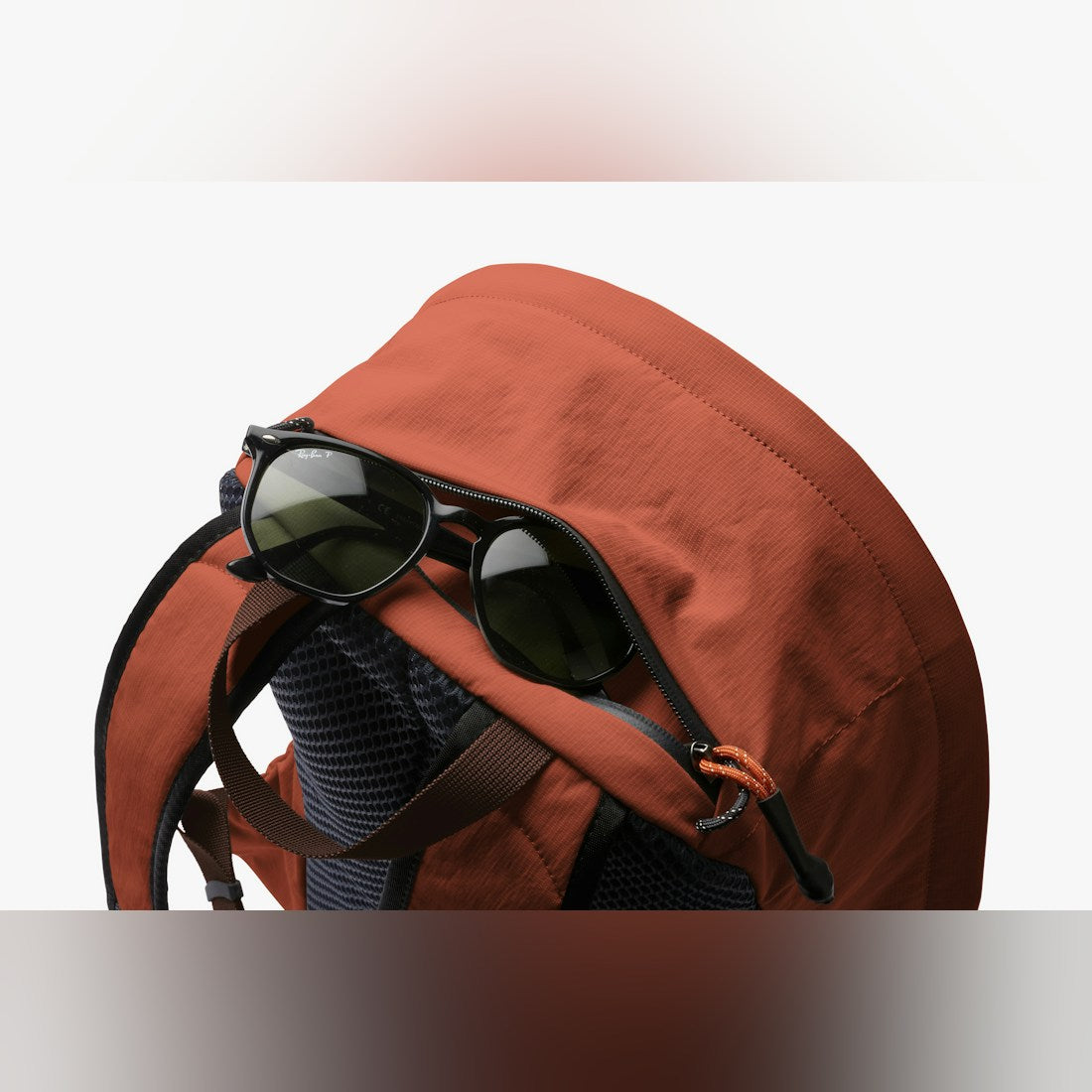 Bellroy Lite Daypack in Clay, close-up of fabric and top handle - The Simple Man