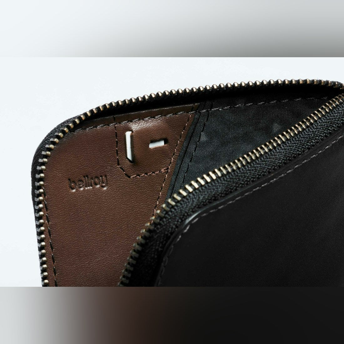 Bellroy Card Pocket wallet in Black, open interior showing brown lining and zipper - The Simple Man