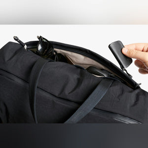 Bellroy Lite Duffel in Black, close-up of fabric, strap and zipper - The Simple Man