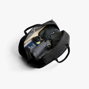 Bellroy Venture Duffel 40L in Black open showing side pockets - The Simple Man