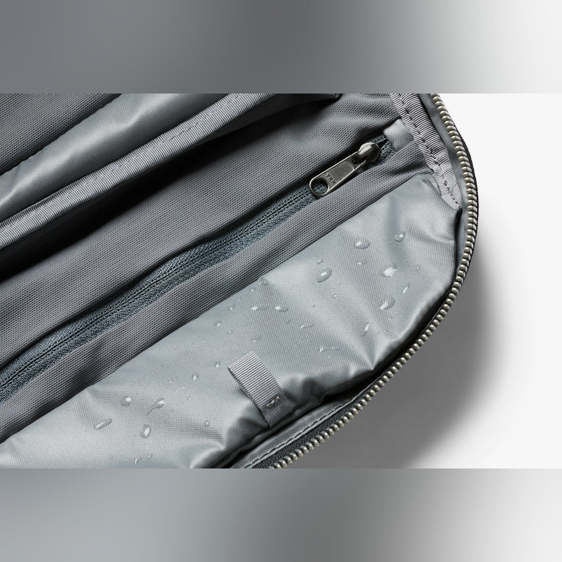 Bellroy Toiletry Kit Plus travel toiletry bag in Black, close-up of interior lining and zipper - The Simple Man