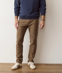 Man wearing 5 Pocket Flex Terry Pant Athletic Fit in Daisy Brown full length front view - The Simple Man