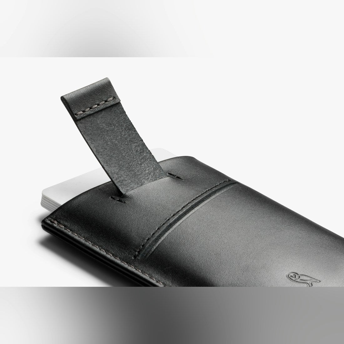 Bellroy Card Sleeve wallet in Black, close-up of the pull tab - The Simple Man