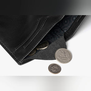 Bellroy Note Sleeve RFID leather wallet in Black, close-up of the coin pocket with coins - The Simple Man