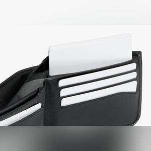 Bellroy Hide & Seek RFID leather wallet in Black, close-up of card slots with a card pulled up - The Simple Man