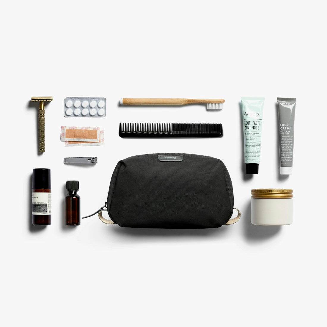 Bellroy Toiletry Kit in Black, flat lay with grooming items - The Simple Man