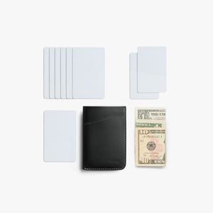 Bellroy Card Sleeve wallet in Black, flat lay with blank cards and cash - The Simple Man