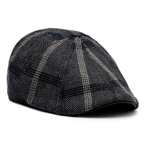 Black Rose Peaky scally cap in black and gray plaid with black leatherette brim, angled view